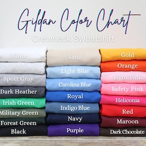 May include: A color chart for Gildan crewneck sweatshirts, showcasing a variety of colors. The chart displays folded sweatshirts in shades like white, ash, sport gray, dark heather, and black, alongside others like gold, orange, and red. The text "Gildan Color Chart" is at the top.