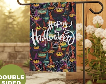 May include: A colorful garden flag with a black background and a pattern of witches' hats and spiderwebs. The text "Happy Halloween" is written in white cursive letters.