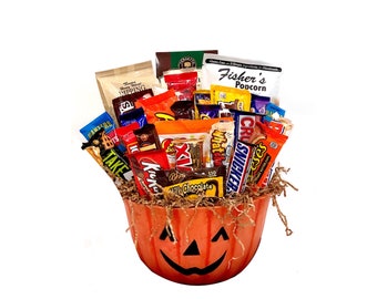 Premium Halloween Pumpkin Gift Basket filled with chocolate, candy, and snacks. Hand-Crafted Halloween gift for kids, families, and clients!