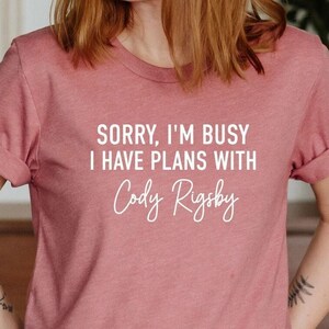 Cycling Shirt, Womens Muscle Shirt, Cute Workout Shirt, Women Gym Shirt, Sorry, I'm Busy I have Plans with Cody Rigsby Tee, Favorite Trainer