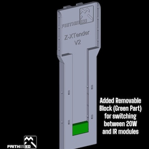 May include: A 3D printed gray plastic Z-XTender V2 module with a green removable block. The text "FAITHIN 3D" is printed on the module. The text "Z-XTender V2" is printed on the module. The text "Added Removable Block (Green Part) for switching between 20W and IR modules" is printed below the module.