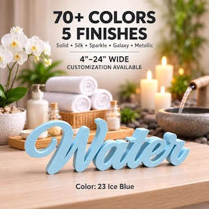 Könnte beinhalten: Ein hellblaues 3D-Schild mit dem Wort Water in Schreibschrift. Der Text auf dem Bild lautet 70+ COLORS 5 FINISHES Solid Silk Sparkle Galaxy Metallic 4-24 WIDE CUSTOMIZATION AVAILABLE und Color 23 Ice Blue. Das Schild steht auf einer Holzoberfläche.