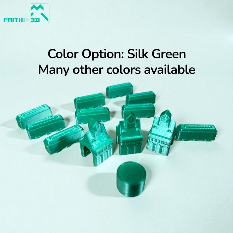 May include: A collection of small, silk green 3D printed game pieces including rectangular blocks, building-shaped tokens with peaked roofs, and a single circular disc. Text reads: Color Option: Silk Green. Many other colors available.