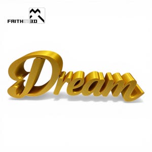 Könnte beinhalten: Ein dreidimensionales, goldfarbenes Schild mit dem Wort Dream in einer kursiven Schriftart. Die Buchstaben haben eine glatte, metallische Oberfläche und werfen einen weichen Schatten. In der oberen linken Ecke befindet sich ein Logo mit dem Text FAITHIN3D.