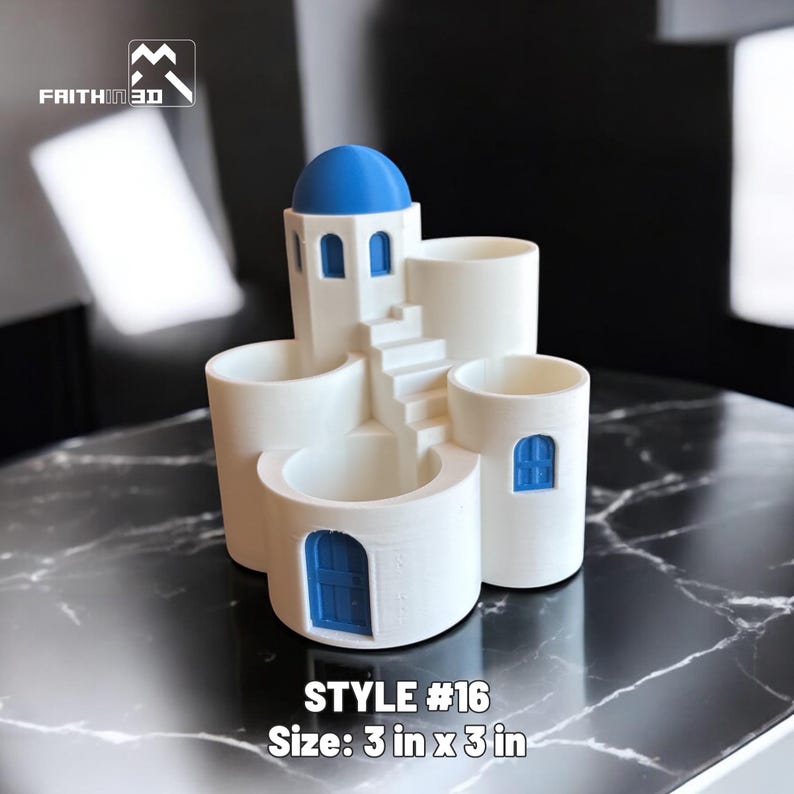 May include: A white 3D-printed decorative planter in the shape of a Greek-style building, featuring a blue dome, doors, and windows. The planter is 3 inches by 3 inches. The text "STYLE #16" and "Size: 3 in x 3 in" are visible.