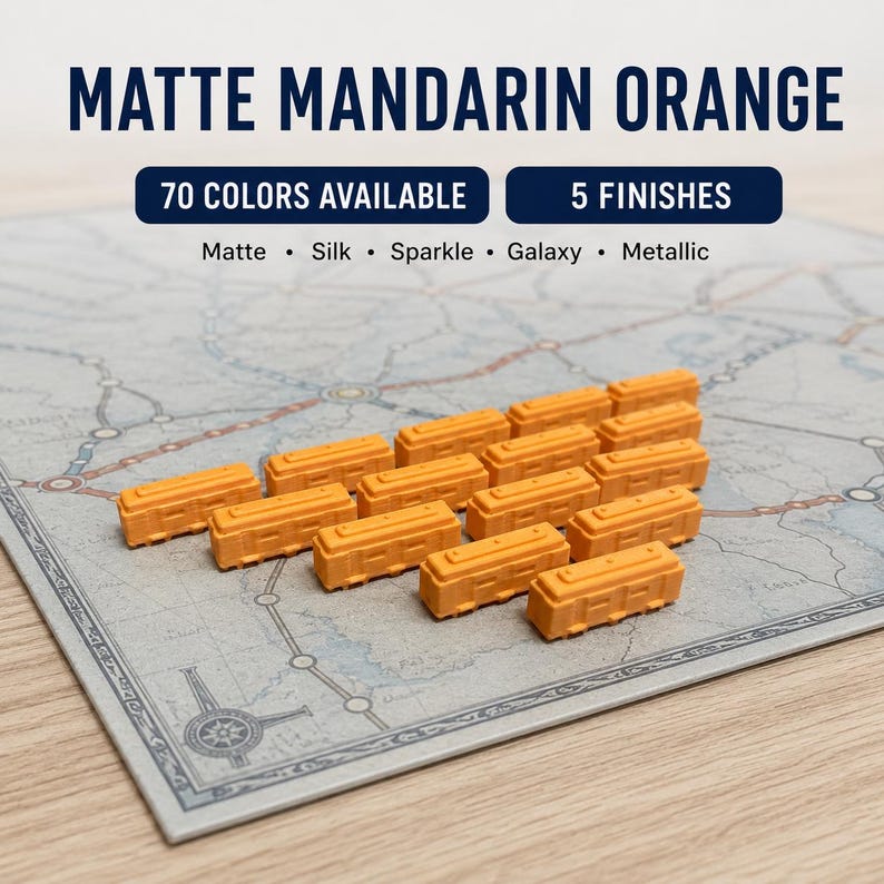 May include: A collection of small, rectangular, matte mandarin orange train car game pieces arranged on a board game map. Text on the image reads: MATTE MANDARIN ORANGE, 70 COLORS AVAILABLE, 5 FINISHES, Matte, Silk, Sparkle, Galaxy, Metallic.