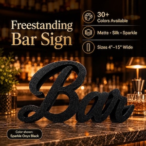 Puede incluir: Un letrero de bar negro independiente en fuente cursiva. El texto en la imagen indica más de 30 colores disponibles, acabados mate, seda y brillo, tamaños de 4 a 15 pulgadas de ancho, y el color mostrado es Sparkle Onyx Black.
