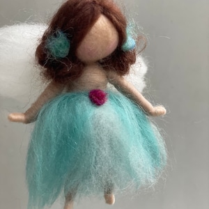 Fairy ornament Needle felted Waldorf inspired doll with hart