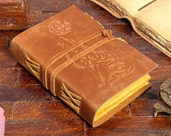 Howling wolf leather Journal | antique handmade | vintage journal | embossed journal | blank spell book of shadows, grimoire journal.