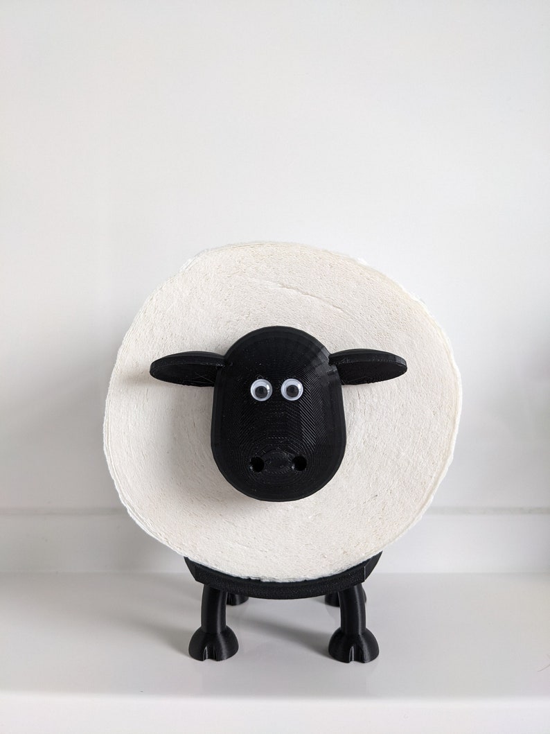 Ein Toilettenpapierhalter Schaf in schwarz