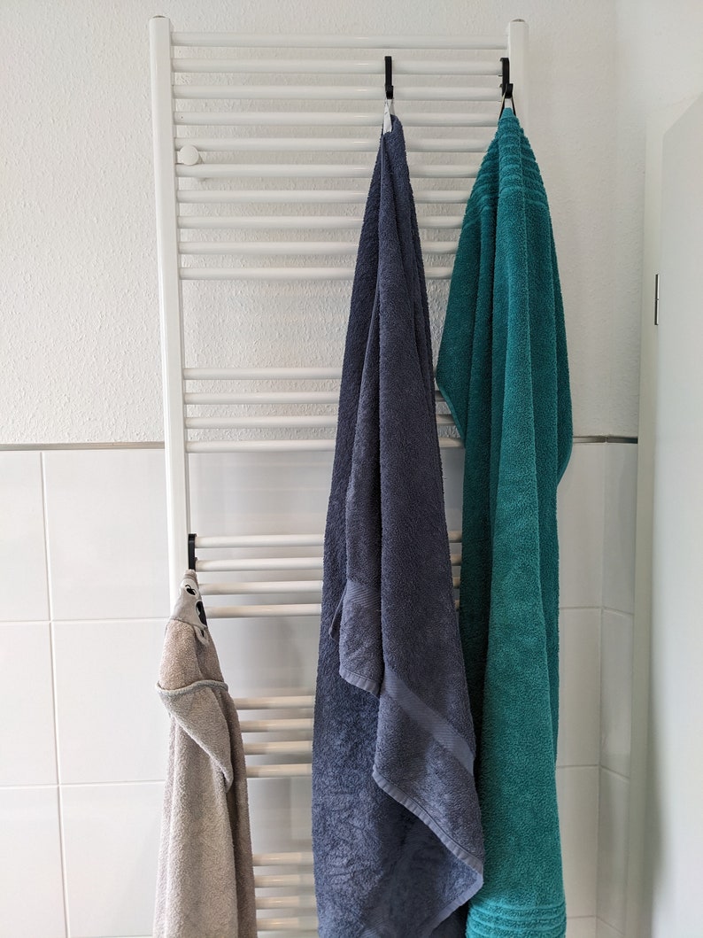 Handtuchhalter für Handtuchheizkörper mit Handtüchern