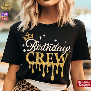May include: Black t-shirt with the words "Birthday Crew" in white and gold glitter lettering. The design includes a gold crown and star accents. The shirt is a crew neck style.