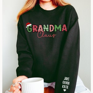 Custom Grandma Claus Christmas Sweatshirt with Grandkid Names Personalized Gigi Christmas Sweatshirt Nana Christmas Gift Mimi Sweatshirt