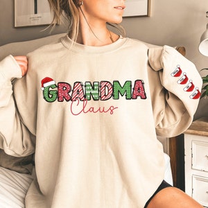 Custom Grandma Claus Christmas Sweatshirt with Grandkid Names Personalized Gigi Christmas Sweatshirt Nana Christmas Gift Mimi Sweatshirt