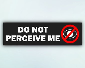 May include: Black and white sticker with the text "DO NOT PERCEIVE ME" in white letters. A red circle with a diagonal line through it is on the right side of the sticker. Inside the circle is a white eye.