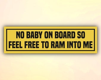 May include: Yellow bumper sticker with black text that reads "NO BABY ON BOARD SO FEEL FREE TO RAM INTO ME".
