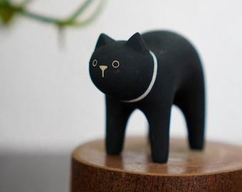 polepole animal |  Black Cat