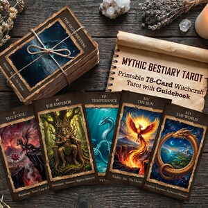 May include: A deck of Mythic Bestiary Tarot cards with a guidebook. The cards feature fantasy art with titles like "The Fool" and "The Emperor." The deck is tied with twine. The guidebook is rolled up. The text on the guidebook reads "Printable 78-Card Witchcraft Tarot with Guidebook."