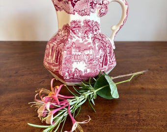 Masons antique pitcher or jug 6.6” high pattern ‘Vista’.  A romantic transfer print in deep pink on just off white ground.