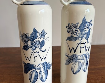 Delft blue and white vintage WF Westermann Dutch gin or rum storage bottles.  Stunning on a shelf display - annual collectors items.