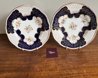 A pair of Copeland ‘dressy’ plates from late 1890’s.  Good condition - very lovely floral posy and gold leaf coral pattern.