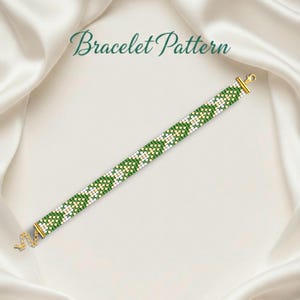 May include: A beaded bracelet pattern in green, white, and gold. The bracelet is made of small, square beads arranged in a geometric pattern. The text "Bracelet Pattern" is in a script font.