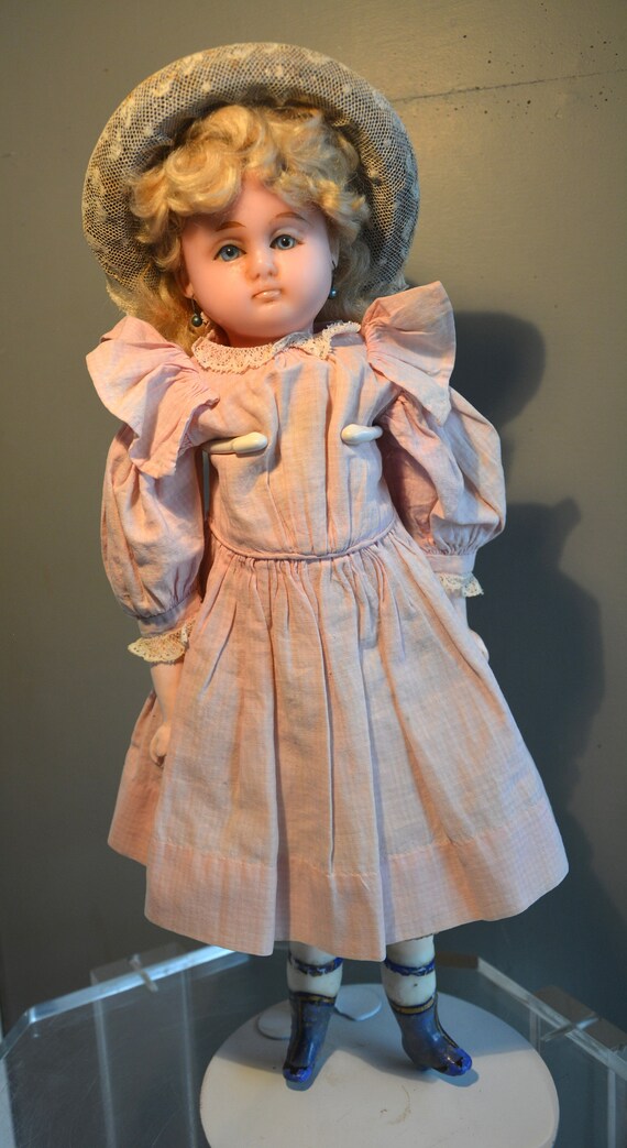 A wax over composition all original Pumpkin head doll, German circa