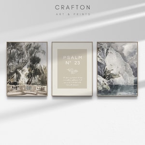 May include: Three framed art prints. The left print depicts a watercolor landscape with trees and a stone structure. The center print has text that reads "PSALM N° 23". The right print shows a watercolor of a mountain and water. The prints are from Crafton Art & Prints.