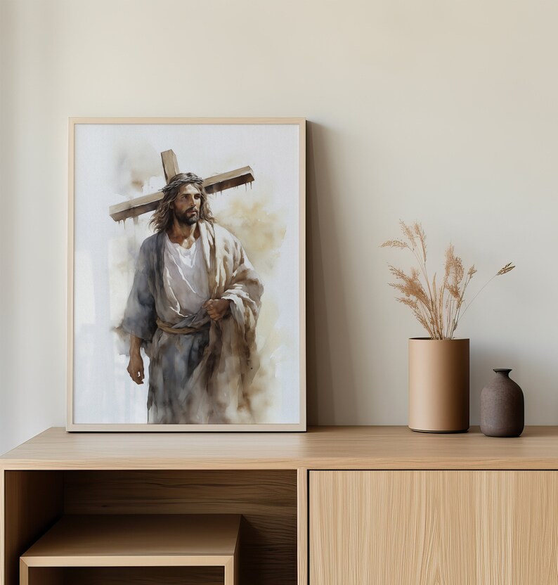 May include: A painting depicting a man carrying a wooden cross on his shoulders. He is wearing a long, flowing robe and has a beard. The background is a soft, watercolour wash of brown and white.