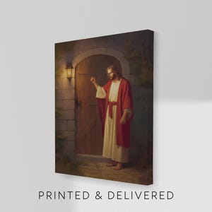 May include: A canvas print depicting a figure in a white robe and red cloak knocking on a wooden door. The scene is set in a stone archway with a lit lantern. The text "PRINTED & DELIVERED" is printed at the bottom.