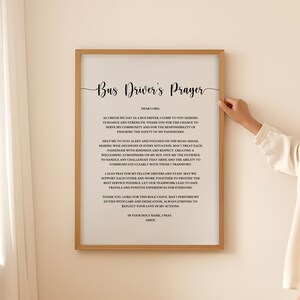 May include: A printable poster with a black and white text design. The poster features a prayer for bus drivers. The text reads "Bus Driver's Prayer" and includes a prayer for safety, guidance, and respect for passengers.