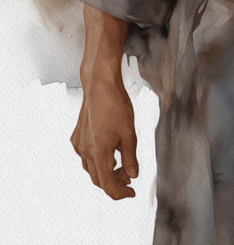 May include: A close-up of a hand with a light brown skin tone. The hand is partially obscured by a grey fabric.