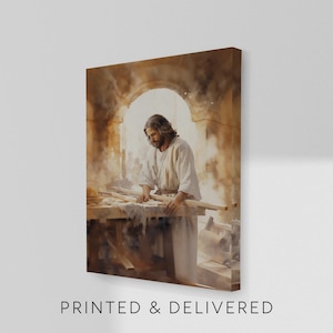 May include: A canvas print depicting a man in a white robe working with wood at a workbench. The image has a warm, sepia tone with soft lighting and the text "PRINTED & DELIVERED" at the bottom.
