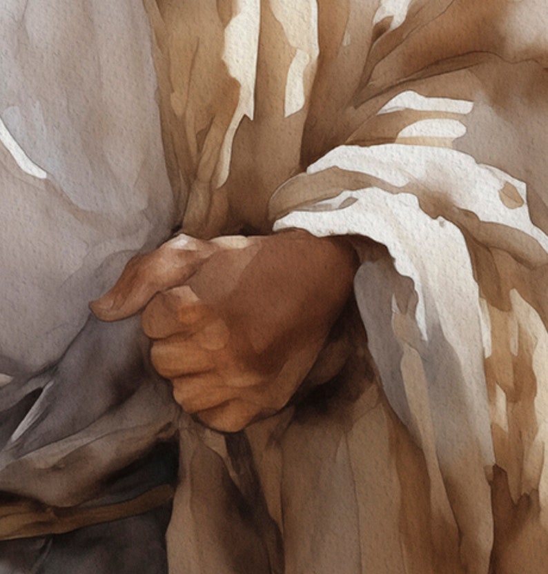 May include: A close-up of a person's hands, with one hand holding the other. The hands are wrapped in a light brown fabric, with a white fabric underneath. The fabric is folded and draped over the hands, creating a sense of warmth and comfort.