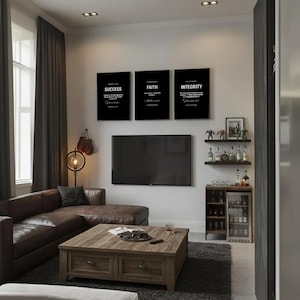 May include: A modern living room with a brown leather sectional sofa, a wooden coffee table, and a large flat-screen TV. Three black framed prints on the wall read "SUCCESS", "FAITH", and "INTEGRITY". A small bar area with shelves and a mini-fridge is also visible.