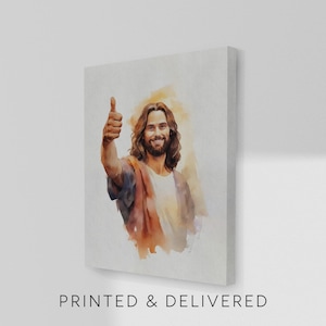 May include: Canvas print featuring a watercolor illustration of a man with long brown hair and a beard, giving a thumbs-up gesture. The artwork has warm tones and is set against a light background. The text "PRINTED & DELIVERED" is at the bottom.