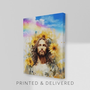 May include: A canvas print featuring a watercolor portrait of a person with long brown hair and a beard, surrounded by sunflowers. The background includes a blue sky with clouds and a rainbow. The text "PRINTED & DELIVERED" is at the bottom.