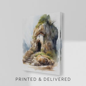 May include: Watercolor print of a small chapel built into a rock formation. The chapel has a white facade, a cross, and a dark arched doorway. The print includes the text "PRINTED & DELIVERED" at the bottom.