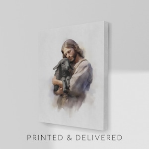 May include: A canvas print featuring a watercolor-style depiction of a person with long hair cradling a black lamb. The person is wearing a light-colored robe. The text "PRINTED & DELIVERED" is printed at the bottom of the canvas.