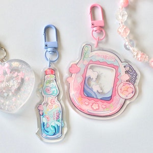 Ramune Tamagotchi phone charm, Acrylic keychain charm, pink and teal, lanyard, marine sakura, waves