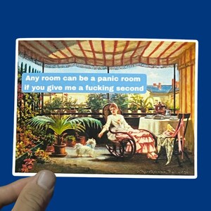 May include: A sticker with a vintage-style image of a woman on a balcony with a dog. The image has text that reads, "Any room can be a panic room if you give me a fucking second."