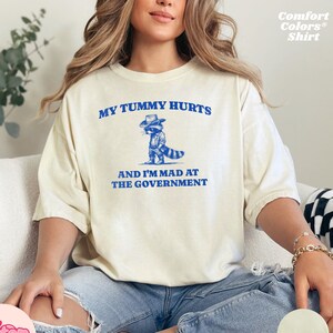 My Tummy Hurts and I&#39;m Mad at the Government Unisex Comfort Colors T-shirt, Funny Political Shirt, Retro Raccoon Sarcastic Tee, Gift for Dad