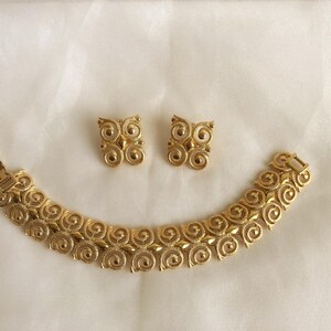 Monet © Jewelry Set Gold Plated Bracelet and Ear Clips from the 1980s image 2
