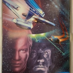 May include: A rectangular Star Trek-themed image featuring the USS Enterprise in space, with a red and blue nebula background. Portraits of two characters are visible, one with fair skin and the other with dark skin. The image has a glossy finish.