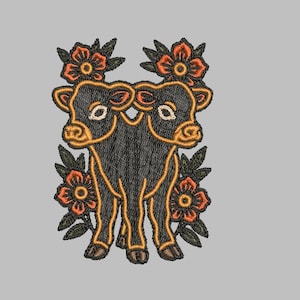 May include: Embroidered patch featuring a two-headed black bull with orange outlines and accents. The bull is surrounded by orange and green floral designs, set against a gray background. This patch is suitable for jackets, bags, or other fabric items.