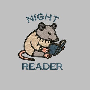 May include: An embroidered design featuring a cartoon rat reading a book. The rat is gray with a tan sweater and a pink tail. The text "NIGHT READER" is embroidered above and below the rat in teal.