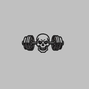 May include: A black and white embroidered design featuring a skull centered between two barbell weights. The skull has detailed eye sockets and a grinning mouth. The weights have black plates and a silver bar, set against a gray background.