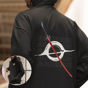 May include: Black hoodie with a white graphic of a sword and the word "ACHERON" repeated four times.