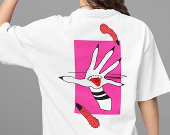 May include: White t-shirt with a pink square graphic featuring a black and white hand with a red mouth and tongue. The hand is reaching out with long, sharp nails. There are three red finger-like shapes around the square.