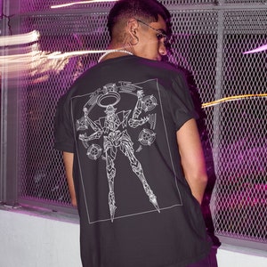 May include: A black t-shirt with a white graphic of a robot with multiple arms and a halo. The robot is surrounded by circles.